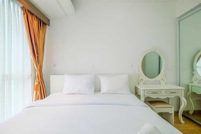 Warm and Comfy 2BR Apartment at Casa Grande Residence By Travelio