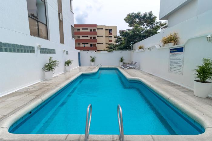 Hotel Axis Inn By GEH Suites