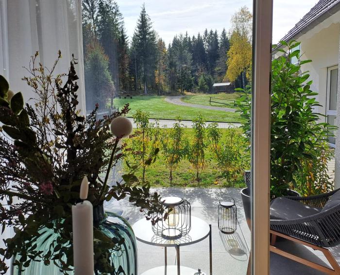 Waldgeflüster 2-Zi-DesignOase mit Terrasse und Tiefgarage im Neubau