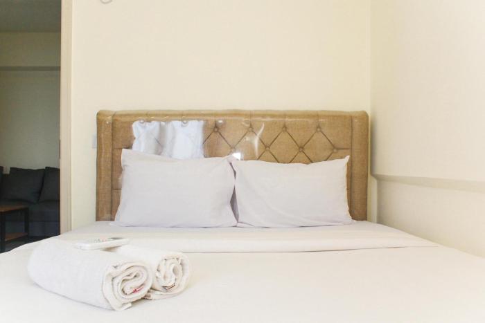 Comfortable and Homey 3BR at Meikarta Apartment By Travelio