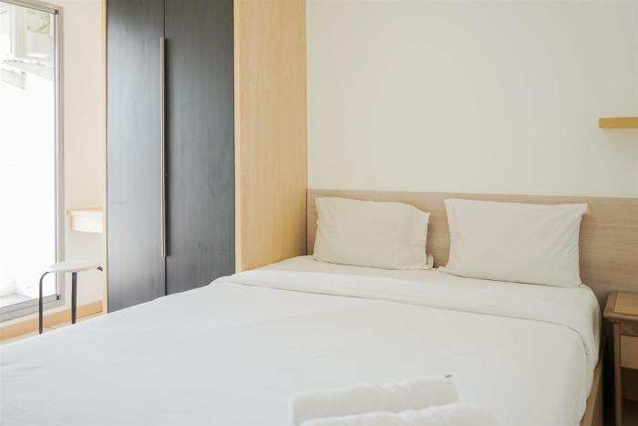 Simple and Cozy 2BR Apartment at M-Town Residence By Travelio