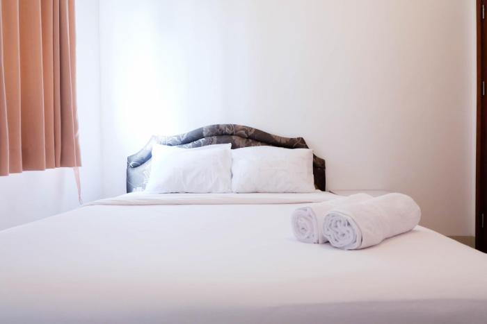 Cozy and Minimalist 2BR Apartment @ Signature Park Grande By Travelio