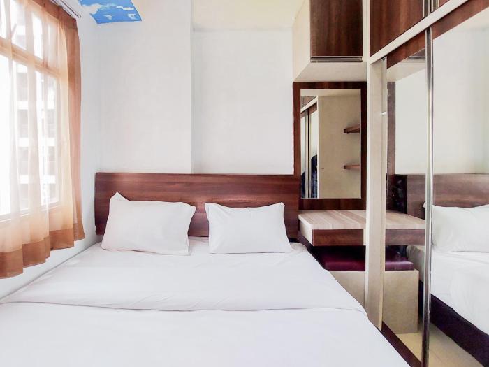 Spacious and Nice 2BR Serpong Greenview Apartment By Travelio