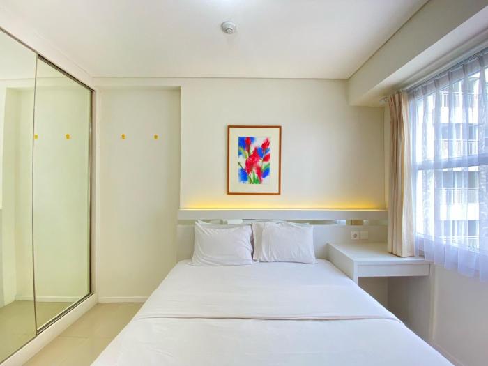 Minimalist and Spacious 1BR Apartment at Parahyangan Residence By Travelio