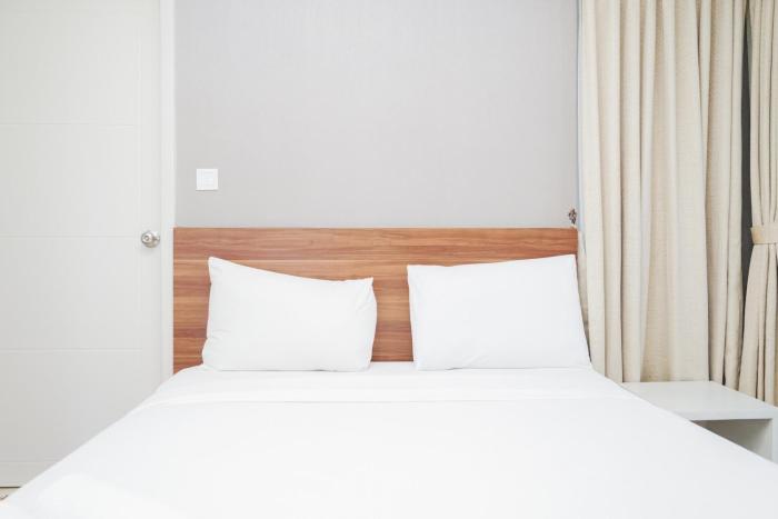 Best Mordern and Homey 2BR Apartment at Casa Grande Residence By Travelio