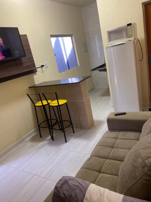 Flats com ar condicionado, garagem e internet