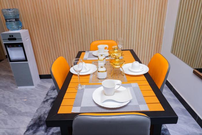 elegant luxurious three bedroom with heated swimming pool well equipped gym ample parking space and children playing ground and a relaxing rooftop with and amazing scenic city views