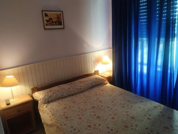 Departamento 4 personas en edificio frente al mar