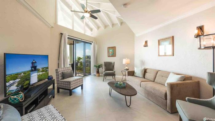 Neptunes Penthouse by Last Key Realty