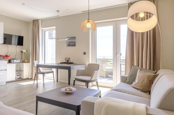 Kleine Strandoase - Ferienwohnung mit Südbalkon, Wellness & Boddenblick