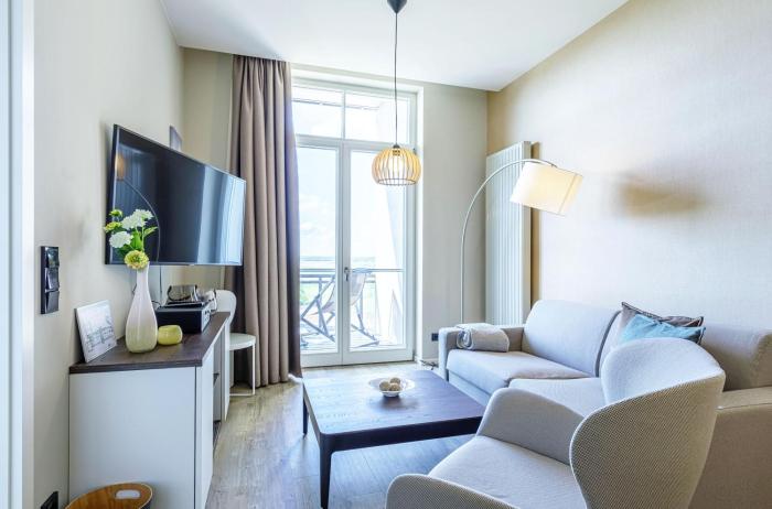 Kleine Welle - Haustierfreundliches Zwei-Zimmer Apartment mit Südbalkon und Platz für drei Personen im ersten Obergeschoss