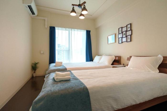 黒門市場徒歩5分 通天閣 難波エリア徒歩圏内 トイレと浴室付き まるまる貸切 エレベーター 9階高層904