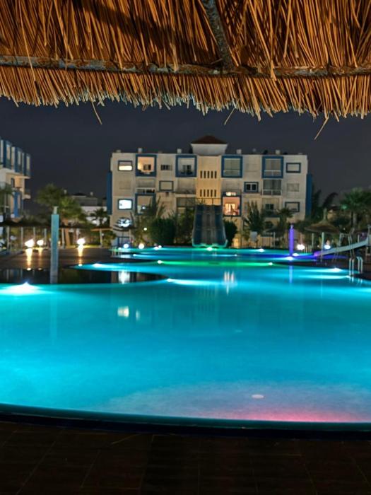 Superbe appartement au centre de Cabo Negro en résidence avec piscines et tobogan