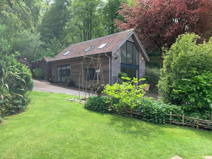Woodside Lodge, surrounded by woodland and beautiful gardens