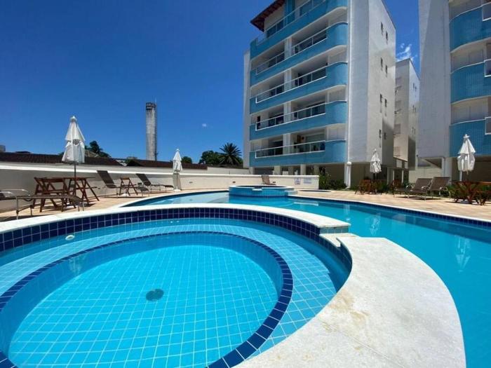 Apartamento 23A para 6 pessoas com Piscina e Churrasqueira no Cond Torremolinos Beach a 80m para Pé na areia na Praia da Enseada Ubatuba