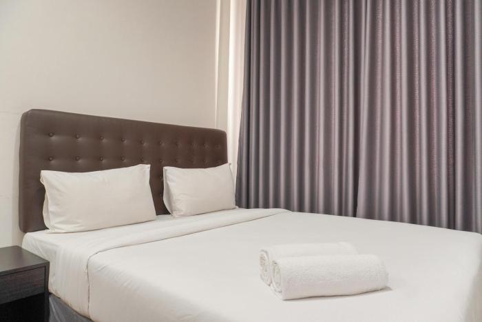 Simply Cozy 1BR at Asatti Apartment By Travelio