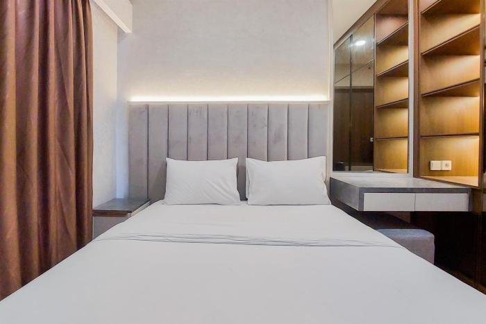 Spacious and Nice 2BR at Sky House BSD Apartment By Travelio