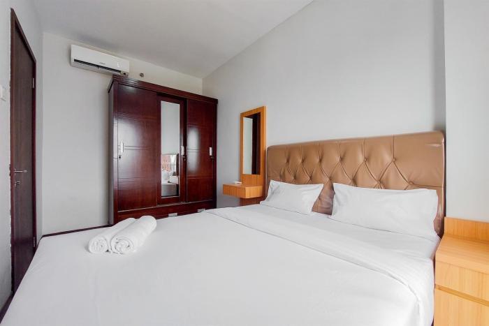 Nice and Comfort 1BR Apartment at Scientia Residence By Travelio