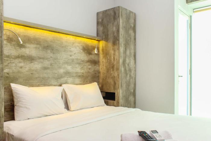 Cozy and Nice Studio at Grand Kamala Lagoon Apartment By Travelio