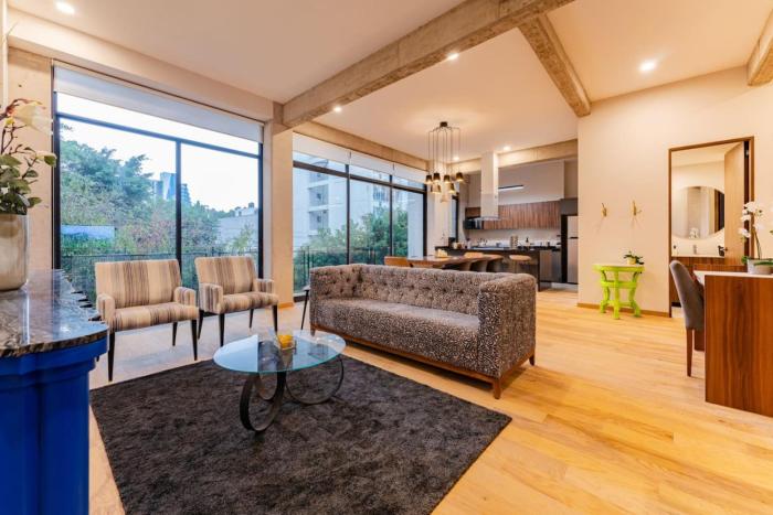 Modern Art Filled Home with Large Living Space and City Views