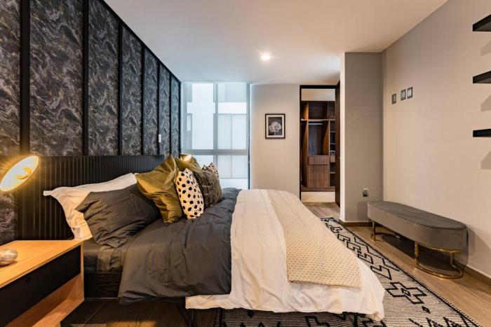 Urban Elegance Apartment with Balcony Views