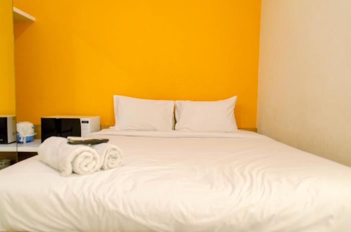 Cozy Living Studio Apartment No Kitchen Aeropolis Residence By Travelio