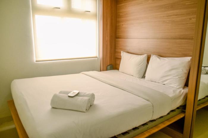 Comfort and Simple 2BR at Green Pramuka City Apartment By Travelio