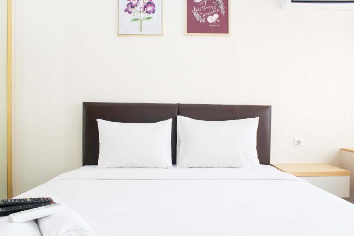 Comfortable Patraland Urbano Studio Apartment near Train Station By Travelio