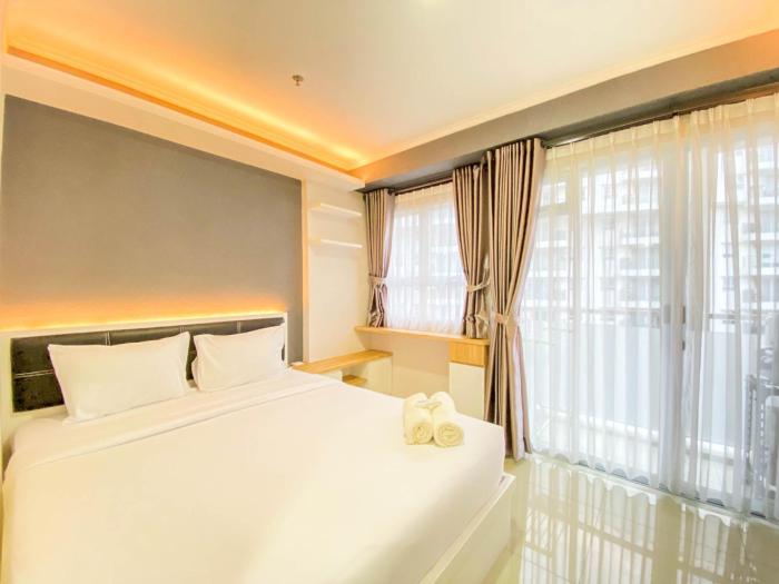 Cozy and Homey 1BR at Gateway Pasteur Apartment By Travelio
