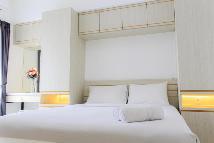 Clean and Comfort 2BR Apartment M-Town Residence By Travelio