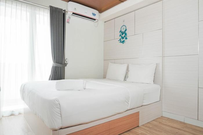 Modern Studio with City View Amethyst Apartment By Travelio