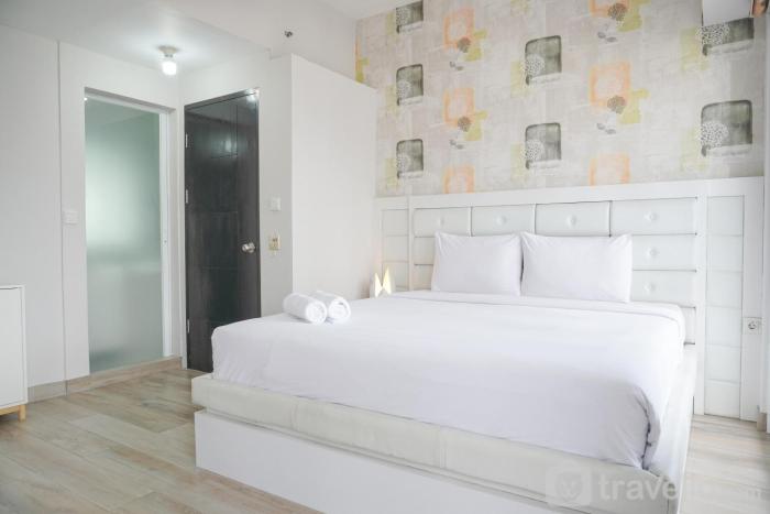 Warm and Comfort Living 1BR at 8th Ambassade Kuningan Apartment By Travelio