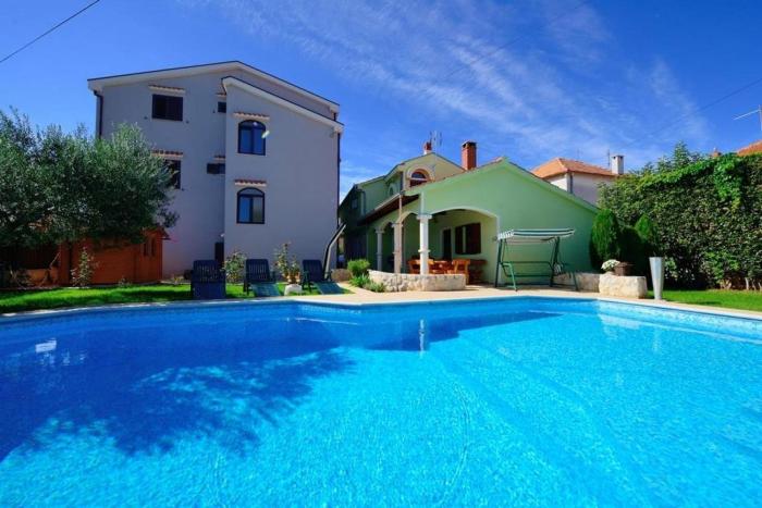 Family-friendly apartments with swimming pool Zadar - 23646