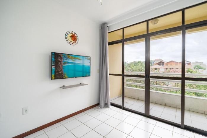 Apto Luar 2Q 10 metros da praia by Achei Floripa