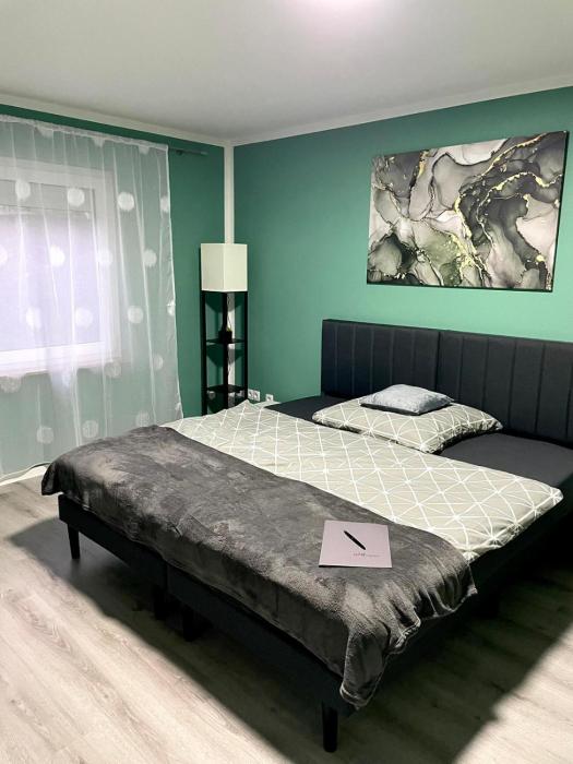 Appartement 3 - geräumige Wohnung mit eigener Küche, Bad und Gartenblick