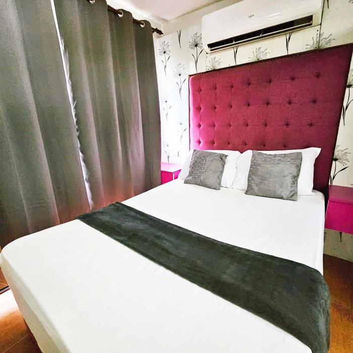 1BR Limketkai condo with WiFi, Netflix and Pool at One Oasis