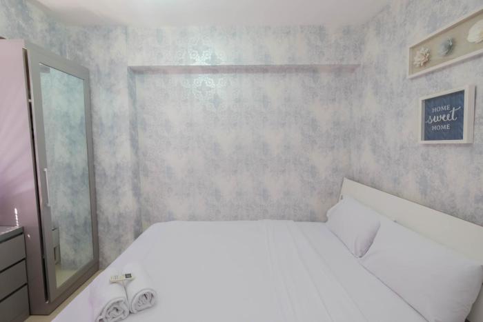 Strategic and Restful 2BR at Bassura City Apartment By Travelio