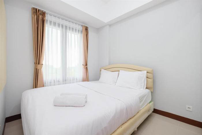 Comfort and Modern 2BR at Royal Heights Apartment By Travelio
