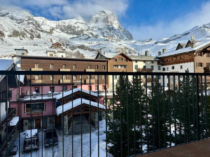 MCX Vacation Rental - Maison Cian, Appartamento con balconi panoramici nel cuore di Breuil Cervinia