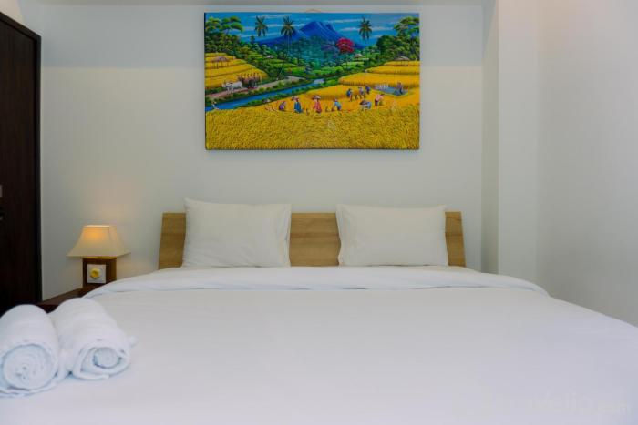 A Luxury 1BR Bali Style Apartment at Branz BSD City By Travelio