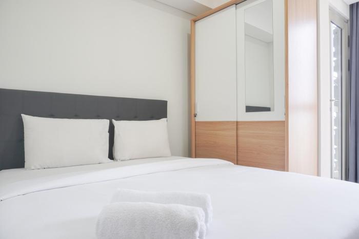 Exclusive and Cozy 1BR at Gold Coast Apartment By Travelio