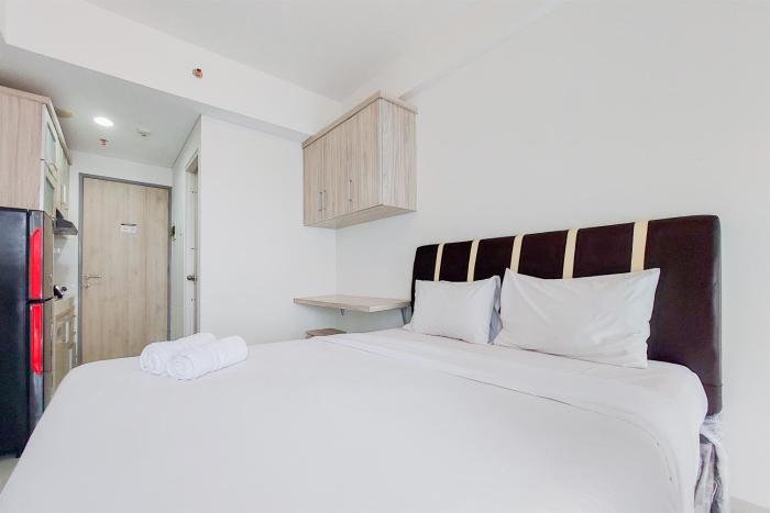 Minimalist and Warm Studio Room Akasa Pure Living BSD Apartment By Travelio