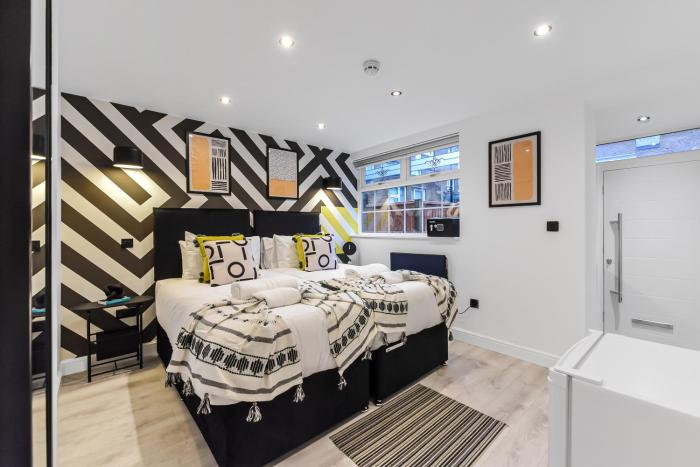 Bright & Bold Studio Perfect for a Chic Stay