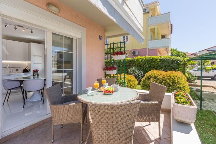 Lichtdurchflutetes Apartment nur 500 Meter zum Strand mit privater Terrasse