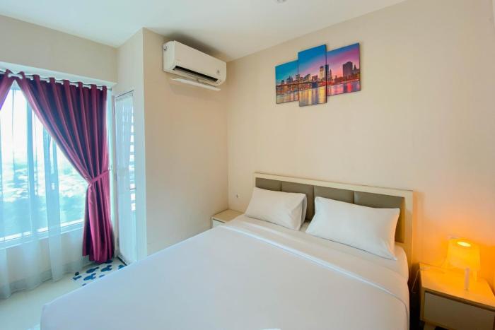 Cozy 1BR without Living Room Grand Kamala Lagoon Apartment By Travelio