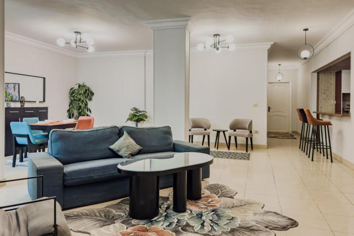 Distinct & Decent 2 BDR Apt Steps From Nightlife and Airport