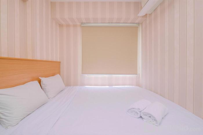 Big and Cozy 1BR Bassura City Apartment near Mall By Travelio