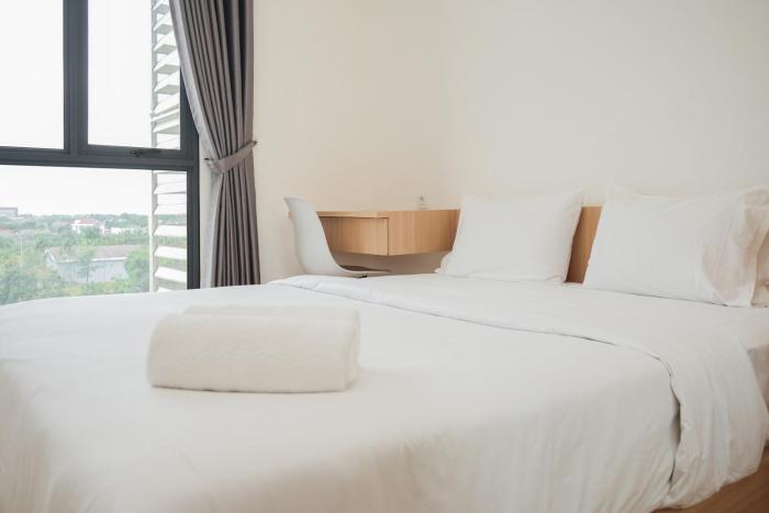Comfortable Design 2BR with Washing Machine Sky House BSD Apartment By Travelio