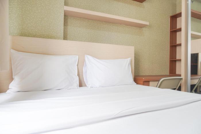 Cozy Stay 1BR at Green Pramuka City Apartment By Travelio