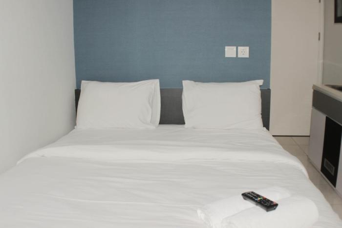 Best Choice Studio Room at Springlake Summarecon Bekasi Apartment By Travelio